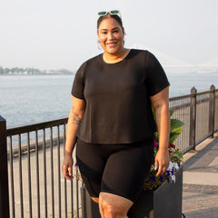 Front view of Black Viscose Crew Neck Tee showing the classic high neckline and relaxed, boxy fit.