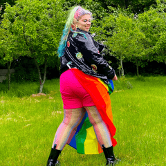 Model wearing rainbow coloured fishnets